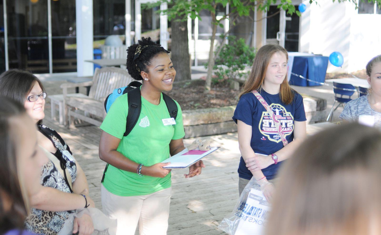 Student leader listening to fellow students in a circle